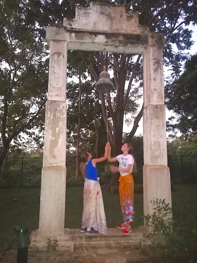 Ringing bell at Pidurangala Temple